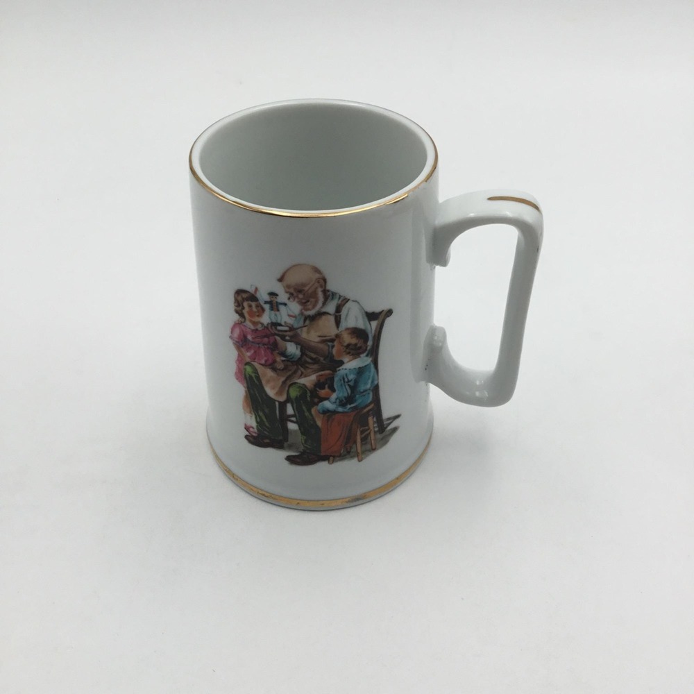 The Toy Maker" Ceramic Mug With Gold Trim‎